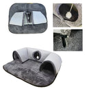 A gray plush pet cat bed shown from multiple angles on a white background, including a main view of the enclosed platform with two arch tunnels, close-ups of the interior opening and a paw-print detail, and a small inset showing a cleaning brush inside.