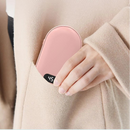 Hand warmer being held by a person,
