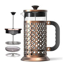 A copper-finished French press with a black handle and lid, shown alongside an exploded view of its removable parts on a white background.  